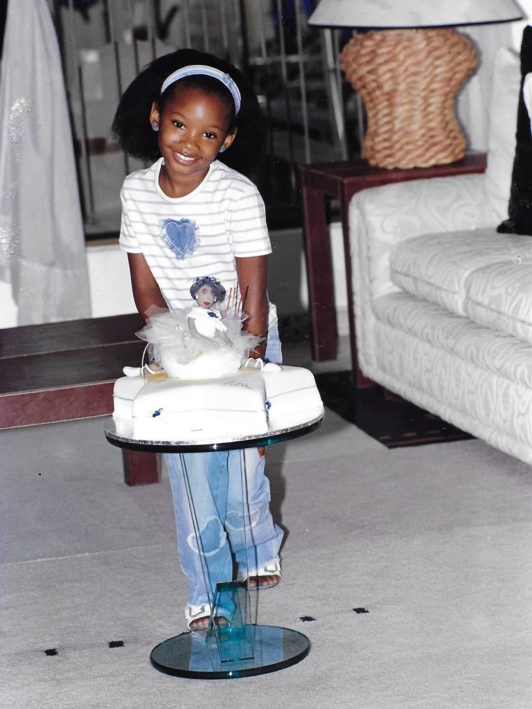 temi otedola as a child with her birthday cake