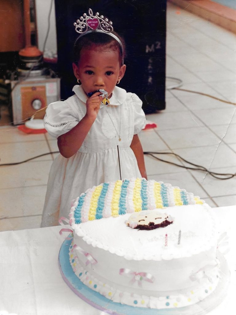 temi ajibade with birthday cake
