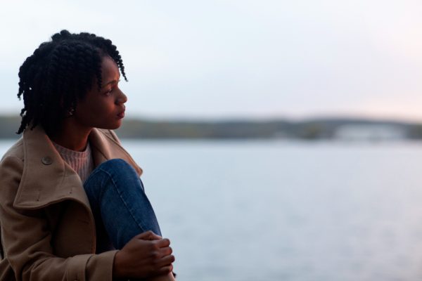 woman seemingly in her 20s lonely