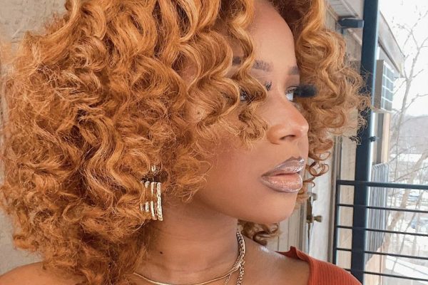 black woman on hair dye