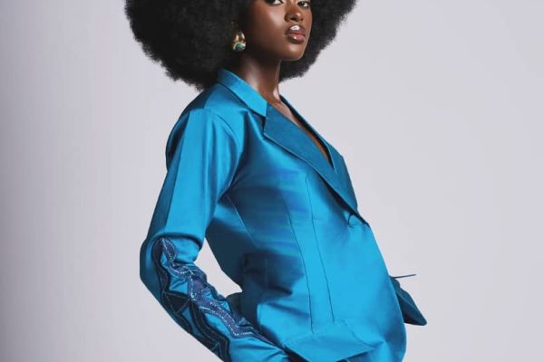 melanin beauty on jumpsuit capsule wardrobe