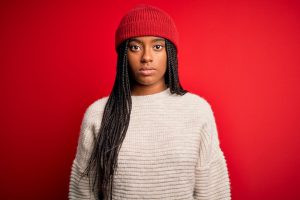 black woman with red background