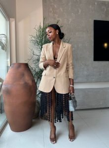 black woman on sheer skirt