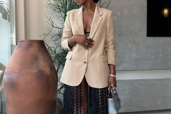 black woman on sheer skirt