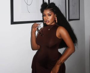 phyna on brown dress